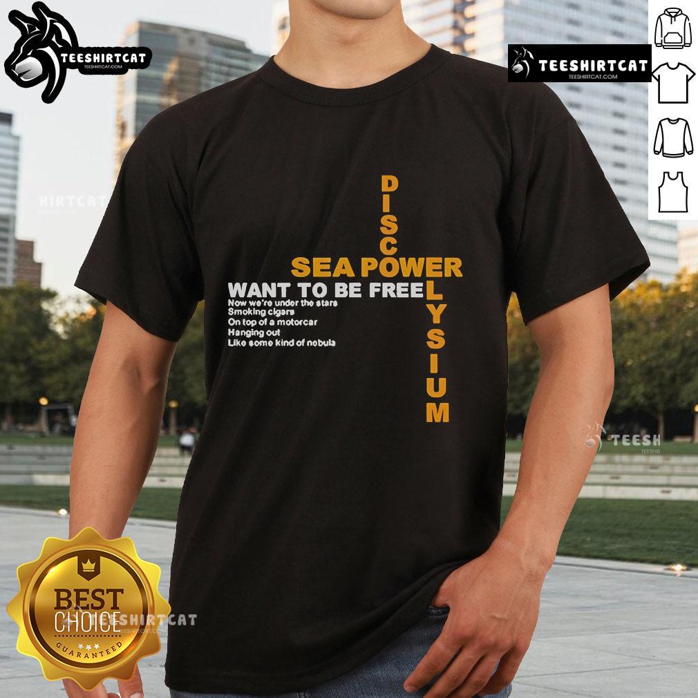 Alt Text: Official Disco Elysium Sea Power Want To Be Free T-Shirt featuring vibrant artwork and bold text design.