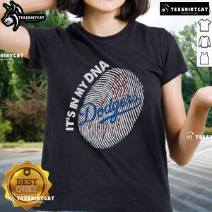 Los Angeles Dodgers ladies tee featuring 'It's in My DNA' design with a fingerprint graphic. Perfect for fans!