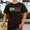 Alt Text: Official Gun Hub Shooting Loads Of Brass T-Shirt featuring a bold graphic design for firearm enthusiasts.