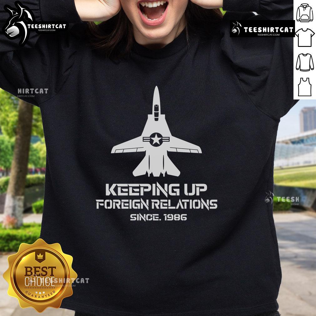 Official Keeping Up Foreign Relations Since 1986 Sweatshirt featuring bold graphic and comfortable fit for casual wear.