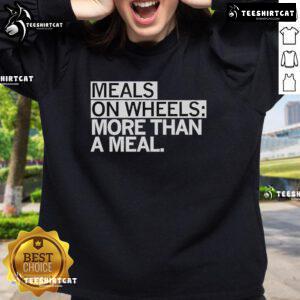 Alt Text: Official Meals On Wheels 'More Than A Meal' sweatshirt showcasing support for community meal programs.