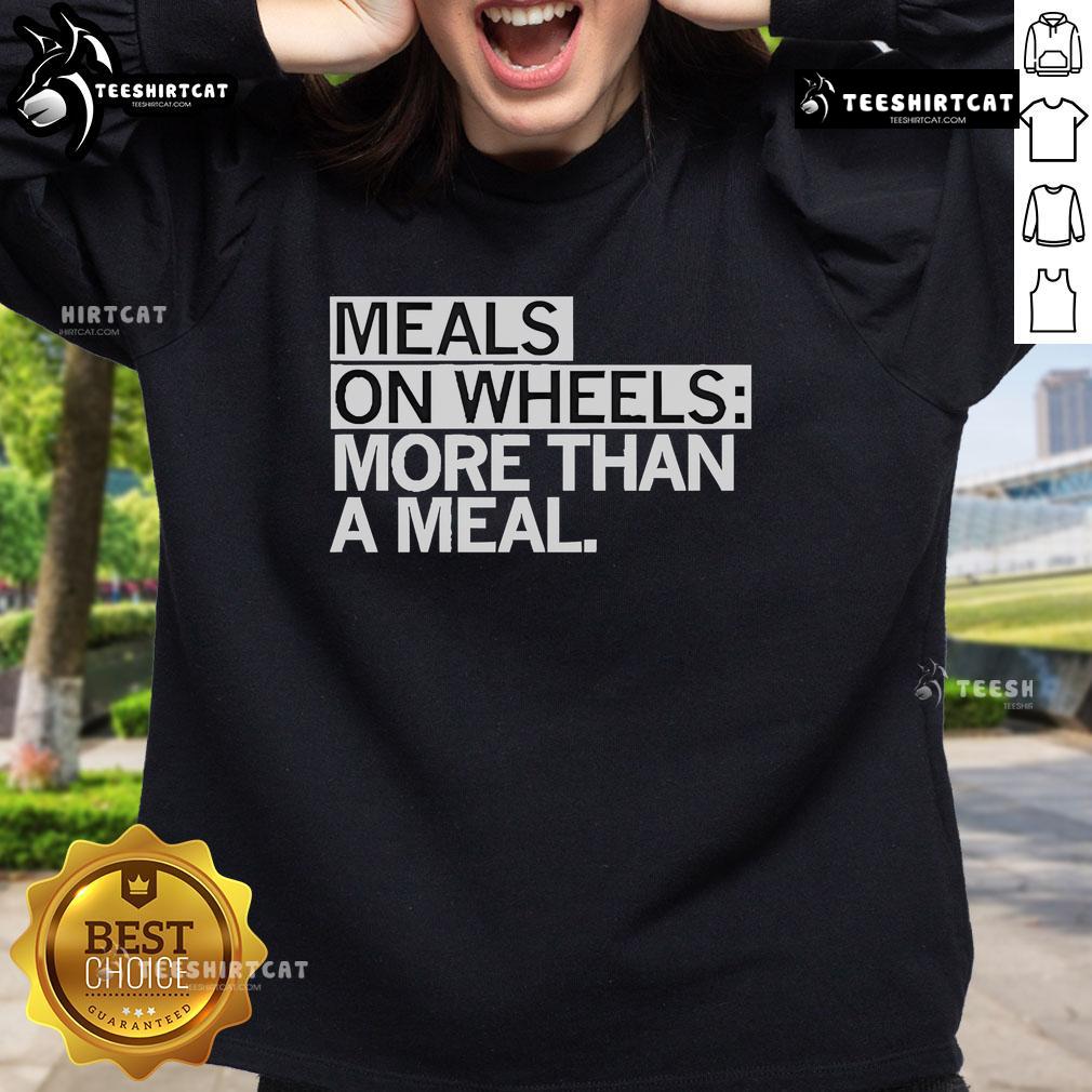 Alt Text: Official Meals On Wheels 'More Than A Meal' sweatshirt showcasing support for community meal programs.