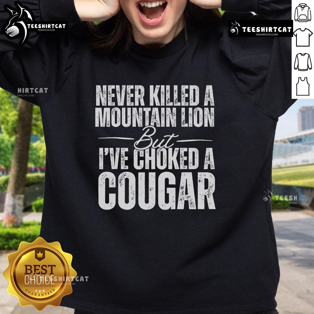 Alt Text: Official Never Killed A Mountain Lion But I've Choked A Cougar Sweatshirt in stylish design, perfect for animal lovers.