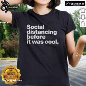 Alt Text: Stylish 'Official Social Distancing Before It Was Cool' ladies tee featuring a fun graphic design in vibrant colors.