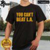 Official You Can't Beat La T-Shirt featuring bold graphic design and vibrant colors for stylish fans of the phrase.