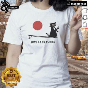 Funny raccoon graphic on a 'Give Less Fck' ladies tee, perfect for casual wear and animal lovers.