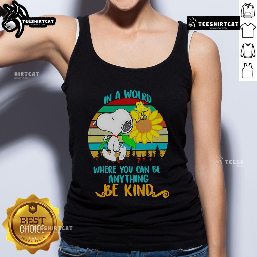 Alt Text: Happy Snoopy with sunflowers on a retro tank top, featuring the quote In a world where you can be anything, be kind.