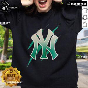 Alt Text: Stylish Jurassic World Rebirth sweatshirt featuring the New York Yankees logo in vibrant colors for fans.