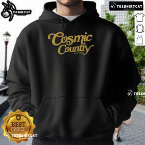 Alt Text: Kaitlin Butts wearing a stylish Cosmic Country hoodie, showcasing trendy country fashion and vibrant design.