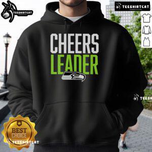 Seattle Seahawks cheerleader in a stylish hoodie, showcasing team spirit and support for the NFL football team.