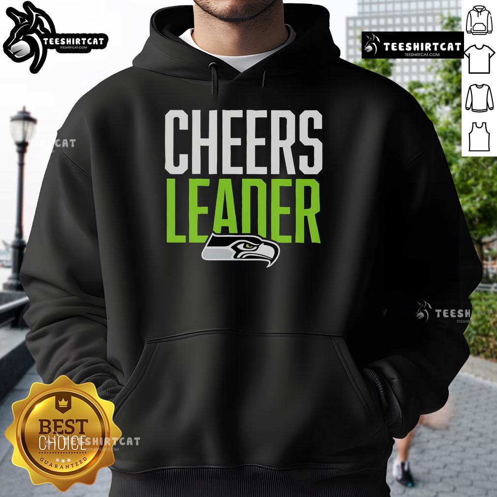 Seattle Seahawks cheerleader in a stylish hoodie, showcasing team spirit and support for the NFL football team.