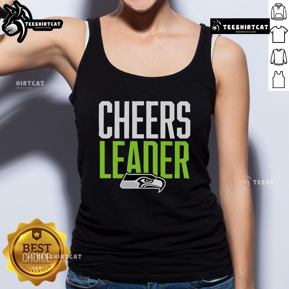 Cheerful Seattle Seahawks cheerleader in a stylish tank top, showcasing team spirit at a game day event.