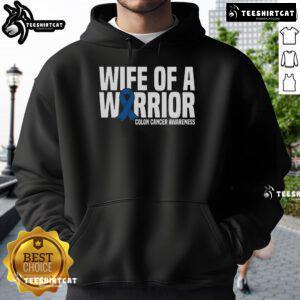 Alt Text: Woman wearing a blue ribbon colon cancer awareness hoodie, celebrating the nice wife of a warrior.