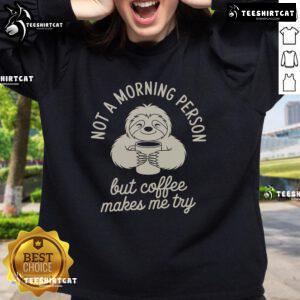 Cozy sweatshirt saying 'Not a morning person, but coffee makes me try' perfect for coffee lovers and casual wear.