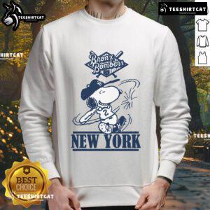 Official Bronx Bombers Snoopy New York Yankees baseball sweatshirt featuring Snoopy in Yankees gear.