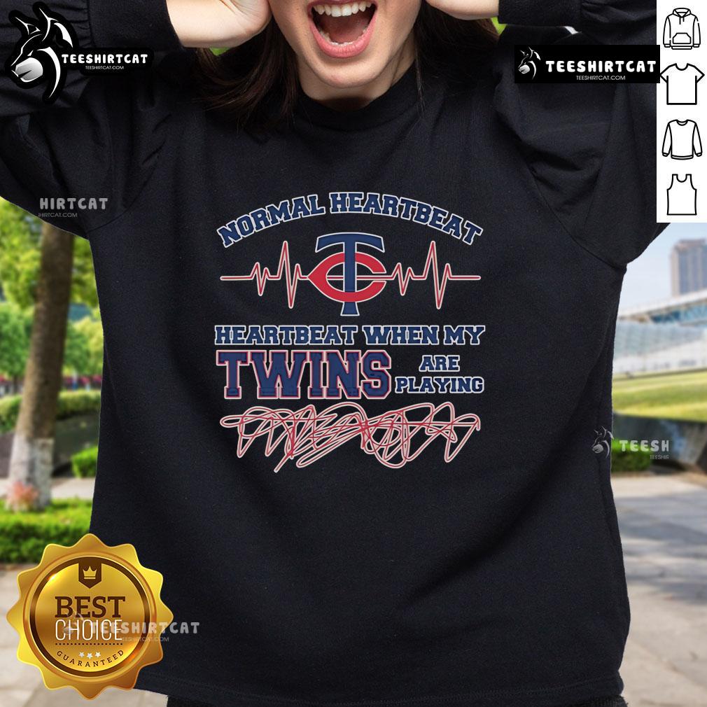 Official Minnesota Twins sweatshirt featuring a heartbeat design for fans during games.