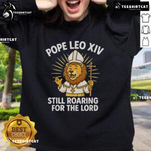 Official Pope Leo XIV 'Still Roaring For The Lord' Lion Sweatshirt featuring a bold lion graphic and inspirational design.