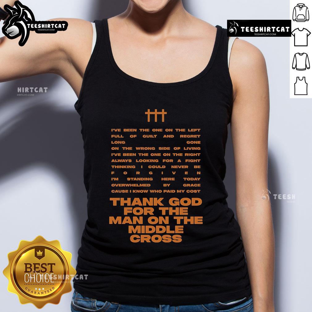 Alt Text: Rhett Walker wearing a tank top with Thank God For The Man On The Middle Cross design, showcasing faith and gratitude.