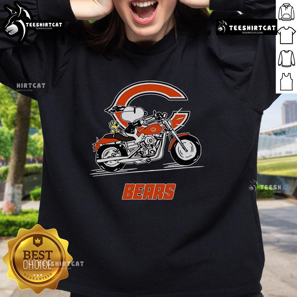 Alt Text: Official Snoopy and Woodstock driving motorbike on Chicago Bears sweatshirt, perfect for fans and cozy style.