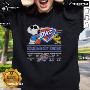 Alt Text: Official Snoopy and Woodstock Oklahoma City Thunder sweatshirt featuring vibrant graphics and cozy design.