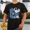Alt Text: Official Snoopy Fan Canterbury-Bankstown Bulldogs X The Peanuts T-Shirt featuring Snoopy and Bulldogs logo design.