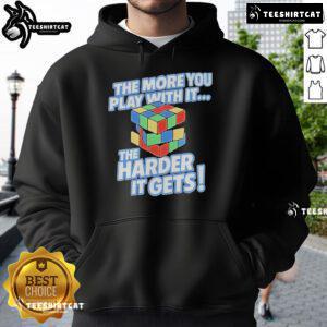 Official 'The More You Play With It The Harder It Gets' Rubik's Cube Hoodie featuring vibrant colors and playful design.