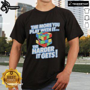 Alt Text: Official The More You Play With It The Harder It Gets Rubix Cube T-Shirt featuring a colorful cube graphic.