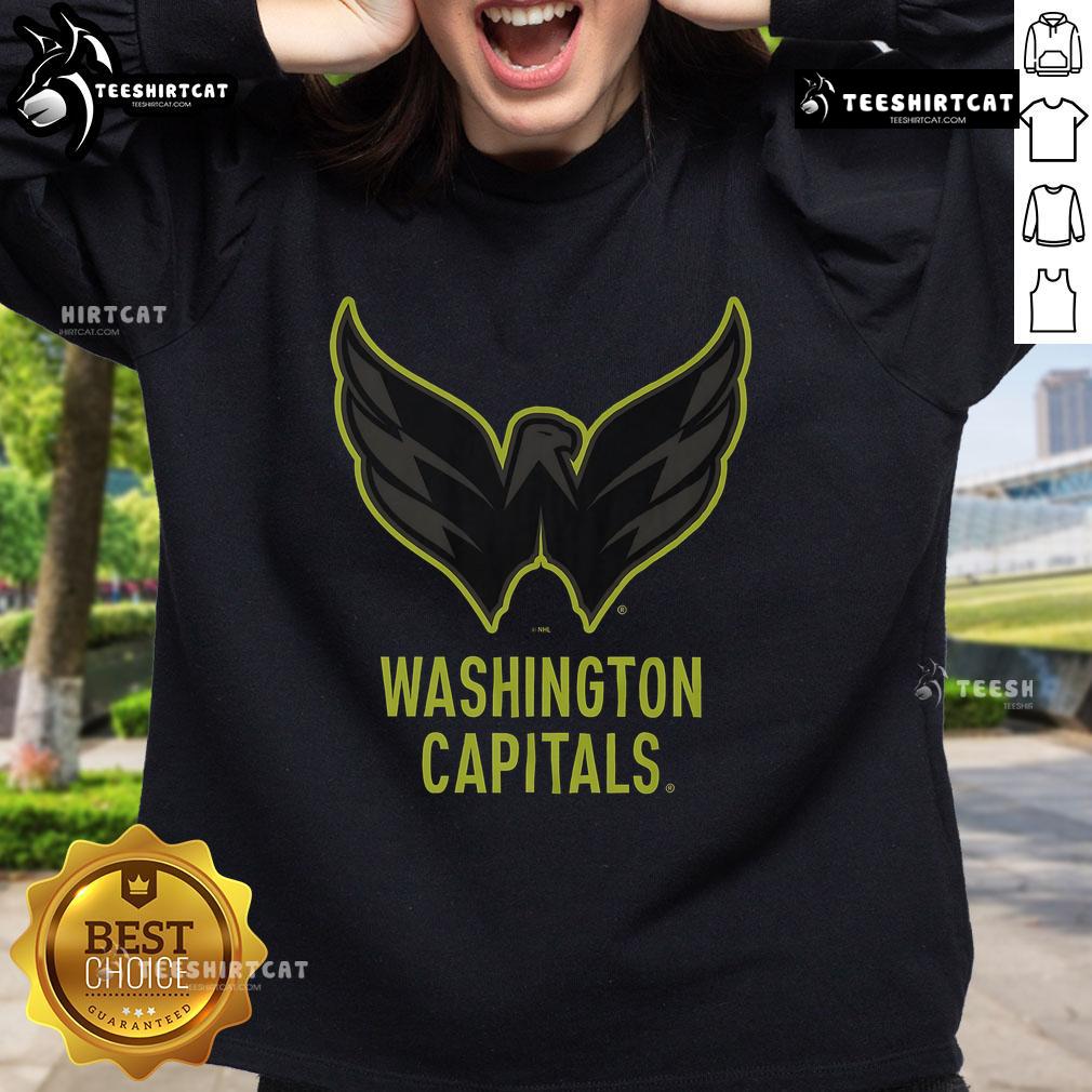 Official Washington Capitals highlight reel sweatshirt showcasing team logo and vibrant colors for fans.