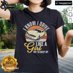 Premium Boostmaster I Know I Drive Like A Girl vintage ladies tee showcasing a stylish graphic design and playful message.