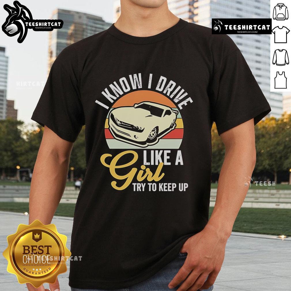 Premium Boostmaster vintage t-shirt featuring 'I Know I Drive Like A Girl, Try To Keep Up' design for car enthusiasts.