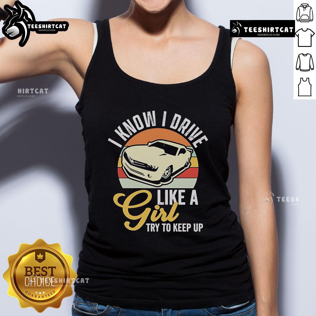 Vintage tank top featuring 'I Know I Drive Like A Girl, Try To Keep Up' slogan from Premium Boostmaster collection.