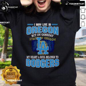 Cozy premium sweatshirt with 'I may live in Oregon, but my heart belongs to Dodgers' design, perfect for game day.