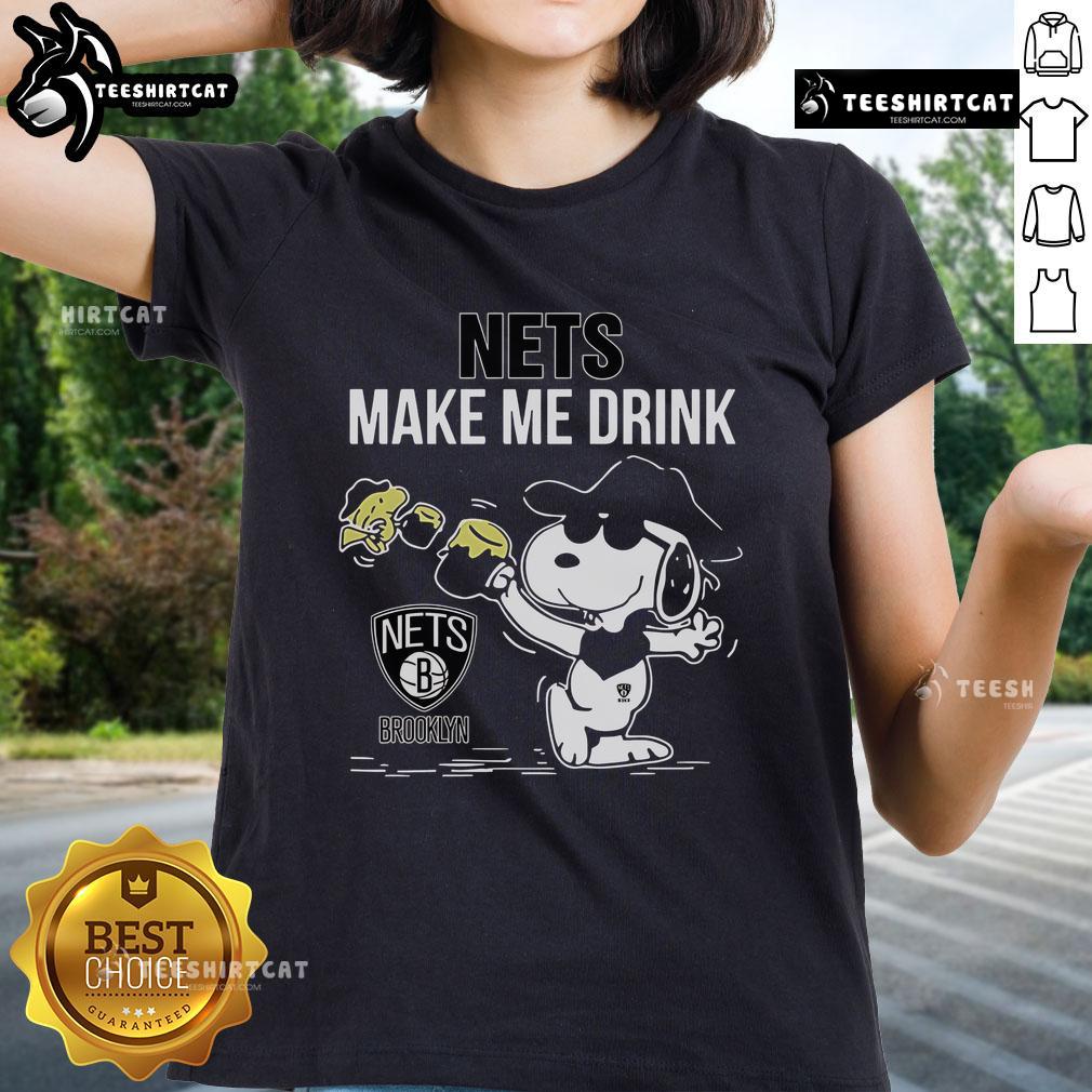 Alt Text: Premium Snoopy and Woodstock Brooklyn Nets Make Me Drink ladies tee showcasing vibrant graphics and stylish design.