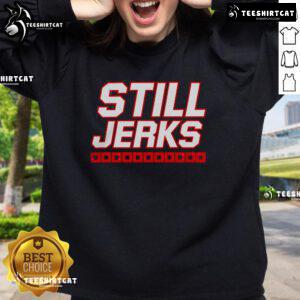 Alt Text: Cozy 'Top Carolina Hurricanes Still Jerks' sweatshirt featuring team colors, perfect for fans supporting their NHL team.