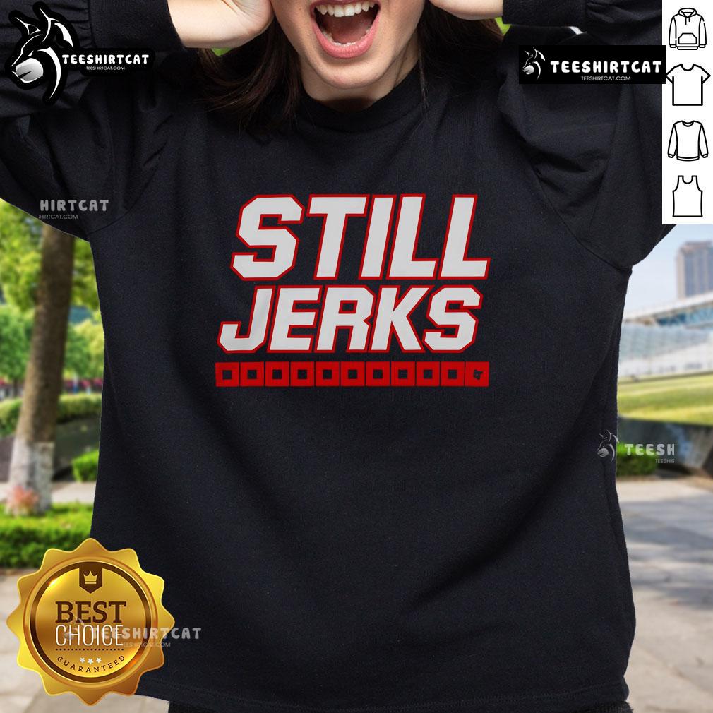 Alt Text: Cozy 'Top Carolina Hurricanes Still Jerks' sweatshirt featuring team colors, perfect for fans supporting their NHL team.