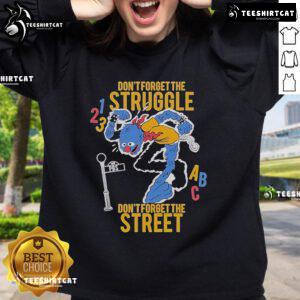 Top Don't Forget The Struggle Don't Forget The Street ABC Sweatshirt in black with bold graphic design.