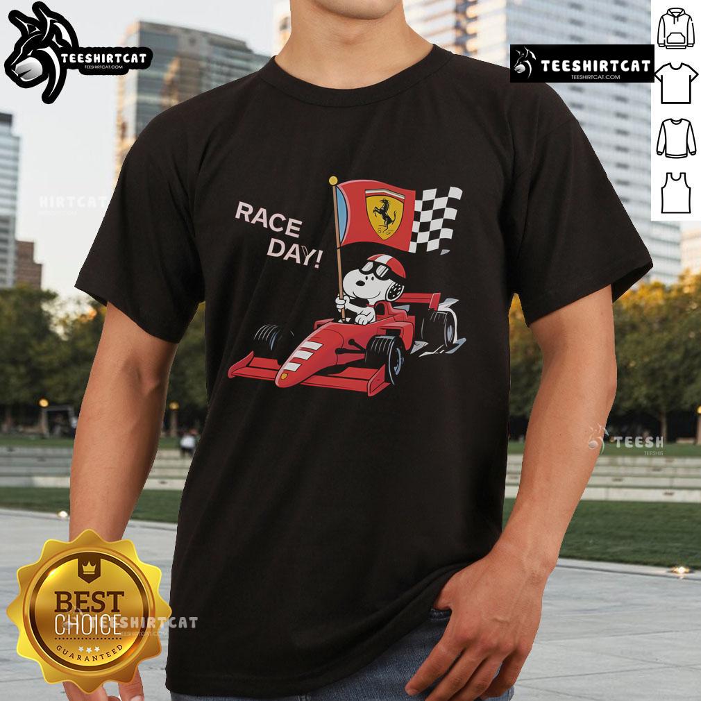 Alt Text: Top Ferrari Snoopy F1 Race Day T-Shirt featuring Snoopy in a Ferrari racing outfit on a vibrant red background.