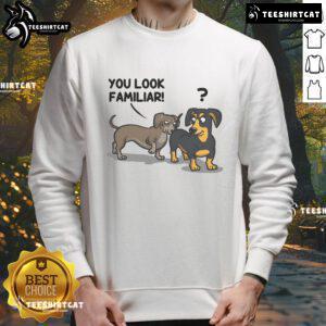 Funny dogs on a cozy sweatshirt with 'You Look Familiar' slogan, perfect for dog lovers and casual wear.
