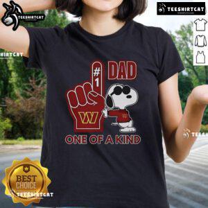 Good Snoopy Washington Commanders DAD One Of A Kind Ladies Tee featuring a unique Snoopy design for fans.
