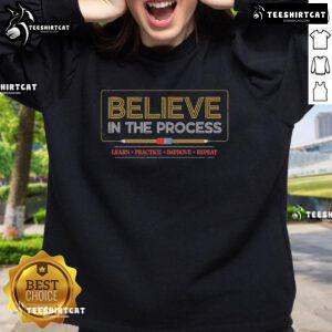 Alt Text: Official Believe In The Process sweatshirt featuring motivational text Learn, Practice, Improve, Repeat in stylish design.