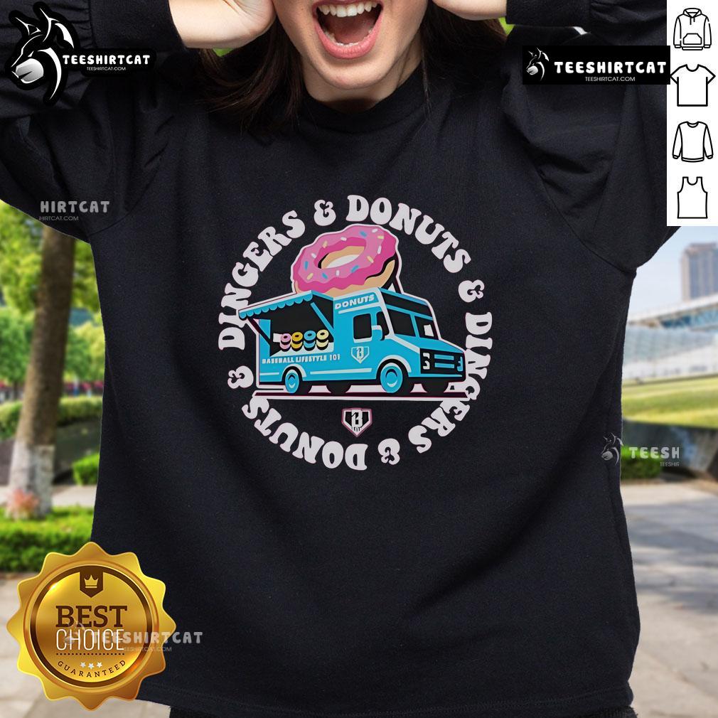 Cozy Official Donut Truck Dingers and Donuts sweatshirt featuring a playful design, perfect for donut lovers and foodies.