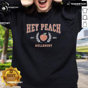 Alt Text: Official Ginny and Georgia Hey Peach sweatshirt from Wellsbury, established 2011, featuring stylish design and cozy fit.
