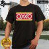 Official Mexico Oxxo gasoline station signs on a Mexican convenience T-shirt, showcasing vibrant colors and iconic branding.