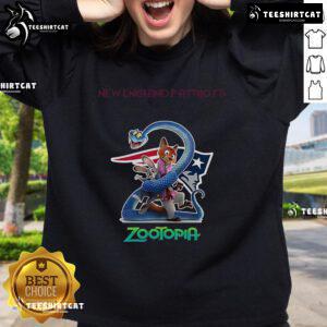 Official New England Patriots Zootopia 2 Sweatshirt featuring vibrant graphics and team colors for fans and collectors.
