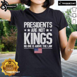 Alt Text: USA flag graphic on 'Official Presidents Are Not Kings' ladies tee, emphasizing no one is above the law in America.
