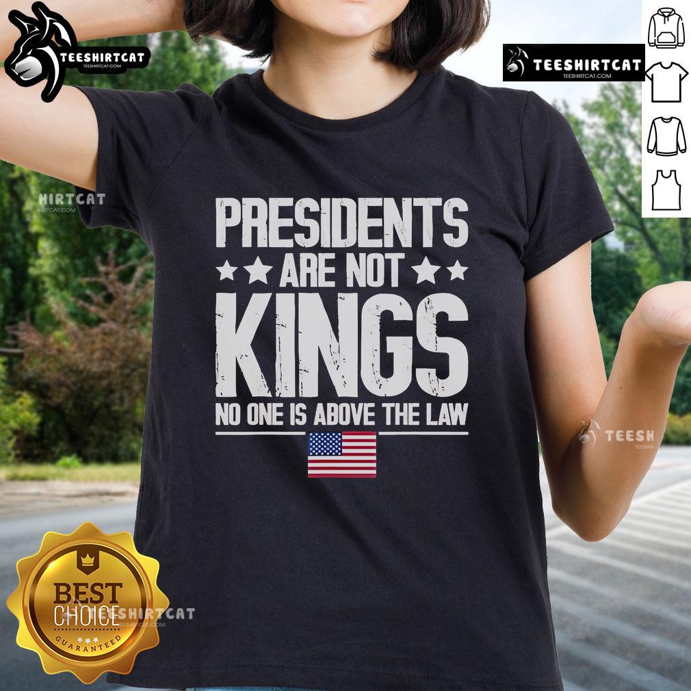 Alt Text: USA flag graphic on 'Official Presidents Are Not Kings' ladies tee, emphasizing no one is above the law in America.