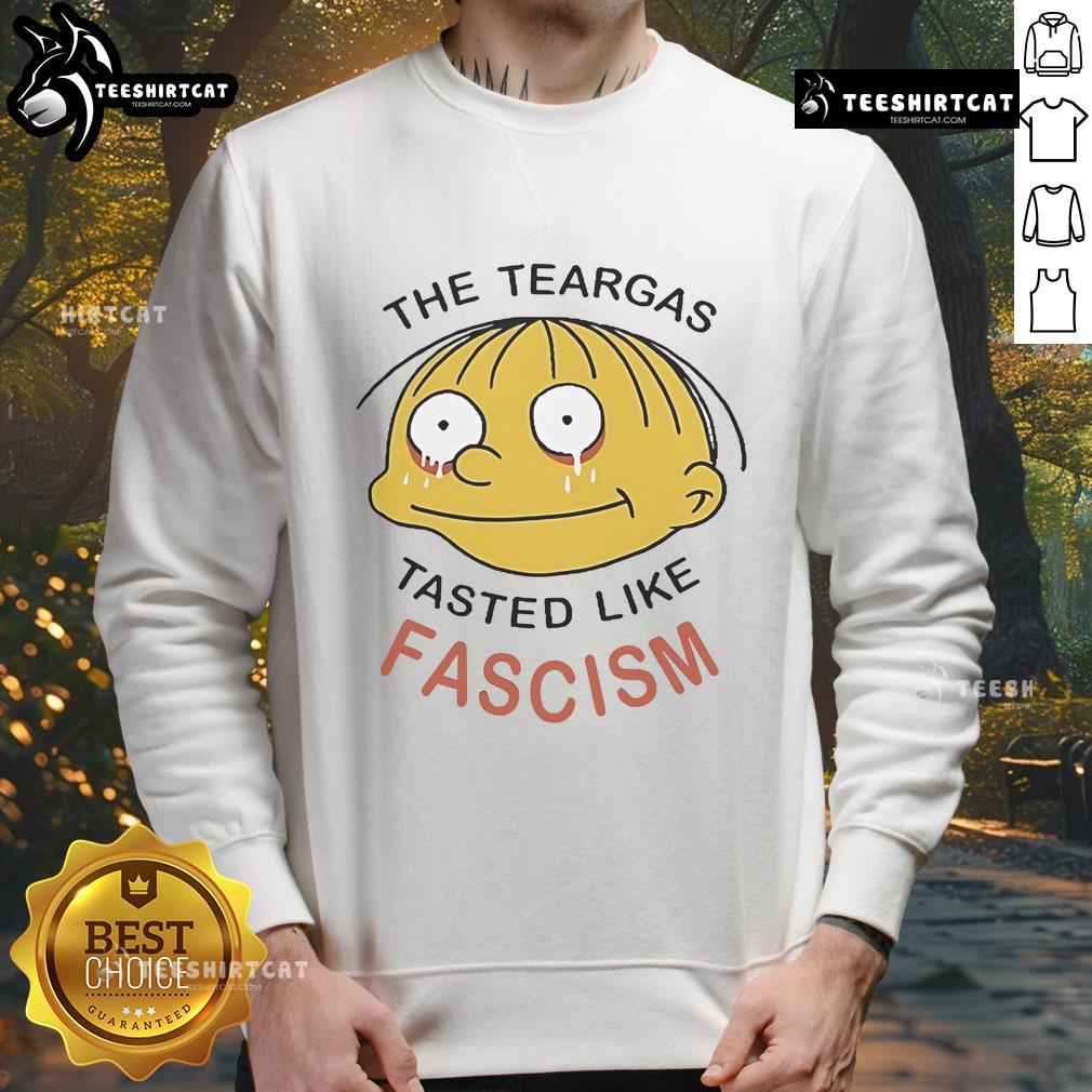 Official Ralph Wiggum sweatshirt featuring 'The Teargas Tastes Like Fascism' design, perfect for fans of The Simpsons.
