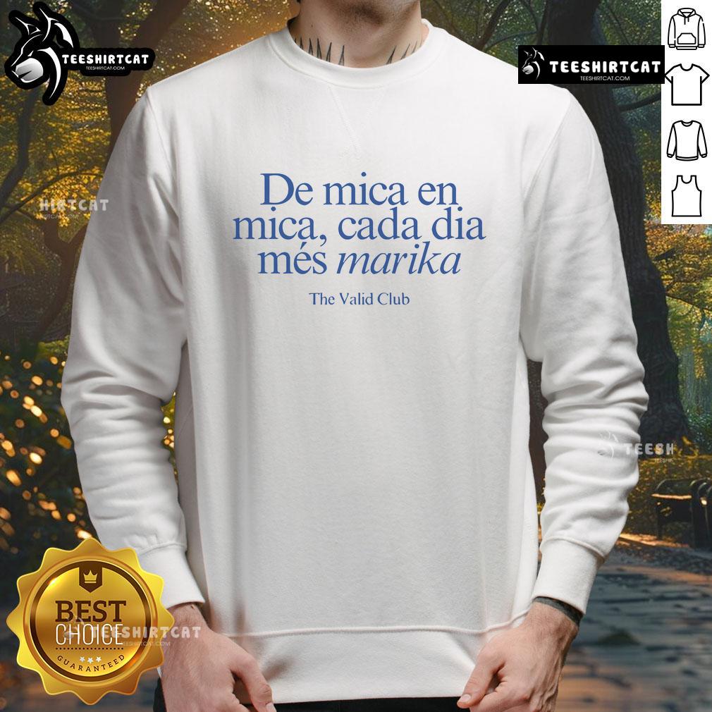 Official Rosalia wearing De Mica En Mica Cada Dia sweatshirt from Marika The Valid Club, showcasing stylish streetwear.
