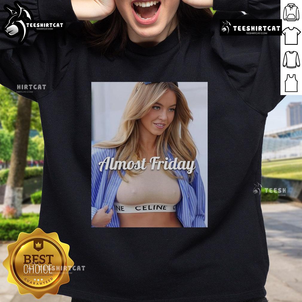 Sydney Sweeney wearing Celine crop top and Almost Friday sweatshirt, showcasing trendy street style fashion.