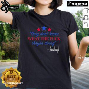 Alt Text: Official They Dont Know What Theyre Doing Trump Signature Ladies Tee featuring bold graphic design and vibrant colors.
